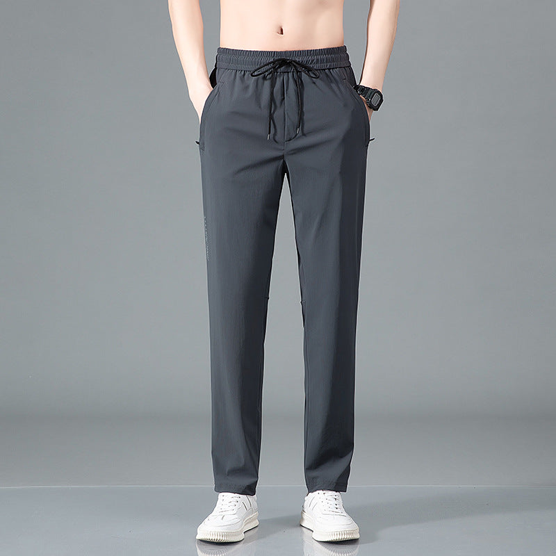 ArcticFlex Men's Ice Silk Casual Pants in gray, designed for comfort and style during warmer months.