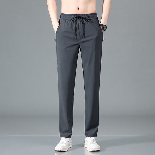ArcticFlex Men's Ice Silk Casual Pants in gray, designed for comfort and style during warmer months.