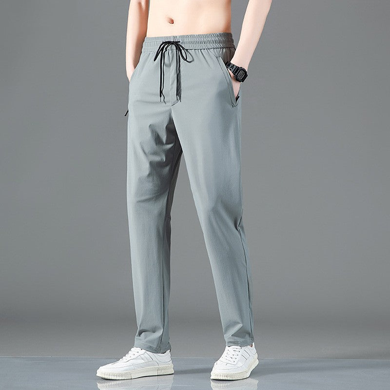 ArcticFlex Men's Ice Silk Casual Pants in gray, designed for comfort and versatility during warm weather.