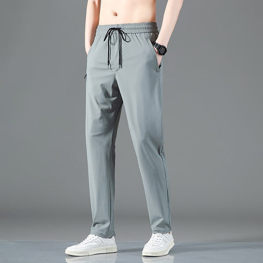 ArcticFlex Men's Ice Silk Casual Pants in gray, designed for comfort and versatility during warm weather.